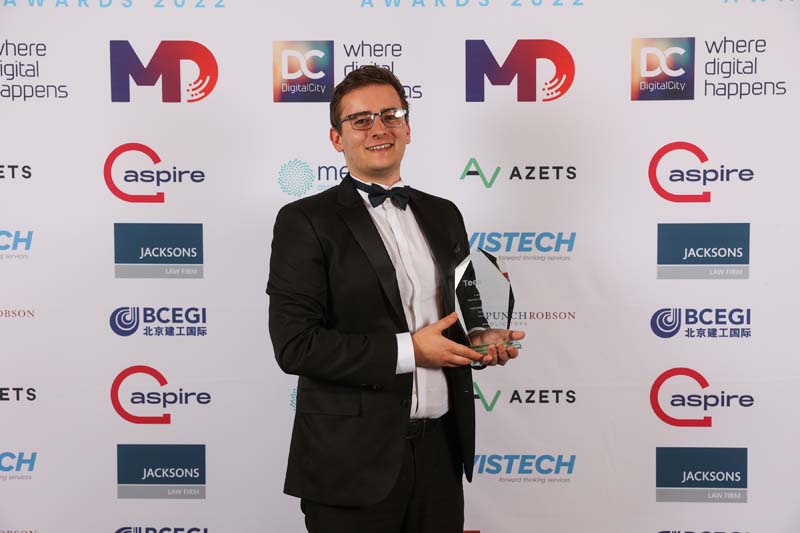 Owain Brennan holding award at the Tees Tech Awards for best newcomer