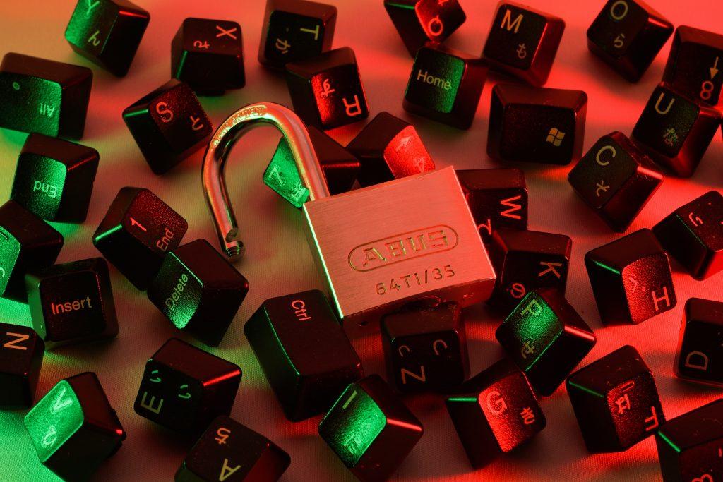 a lock pad infront of keys representing cyber security